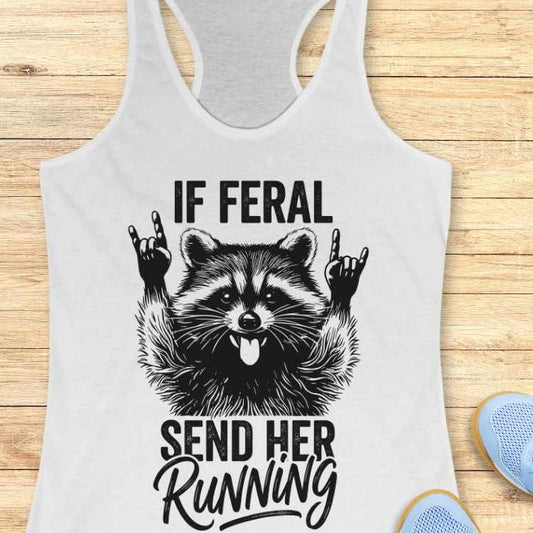 white tank top with a raccoon graphic and text on a wooden surface