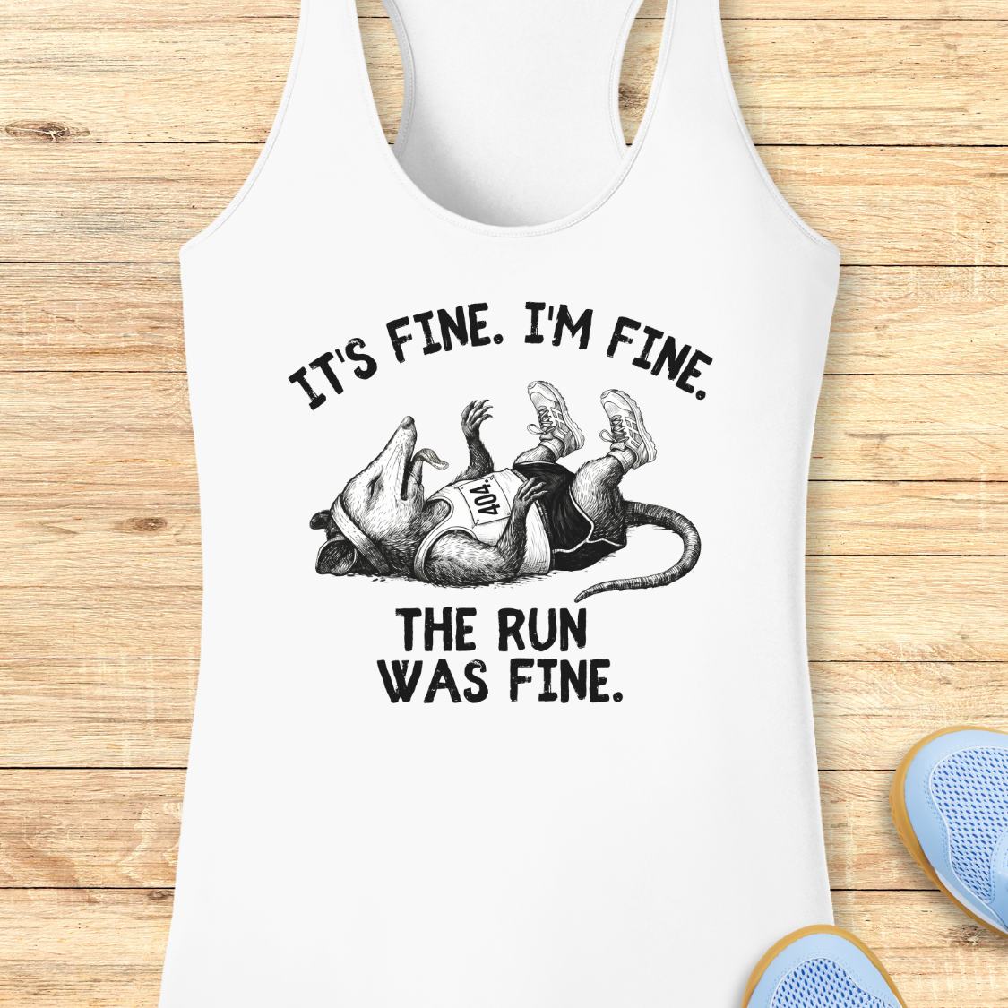 White performance racerback tank top with a black graphic of a running person and the text 'IT'S FINE. I'M FINE.