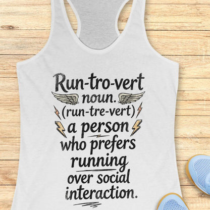 white tank top with text "Run-tro-vert   noun. (run-tre-vert)   a person who prefers running over social interaction." on a wooden surface