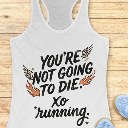White tank top with motivational text "You're not going to die. XO running." on a wooden surface