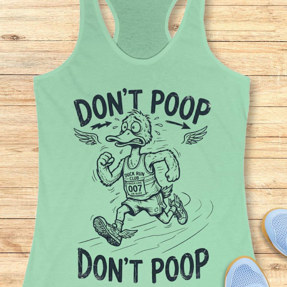 Mint green tank top with a graphic of a duck running and text 'Don't Poop' on a wooden surface.