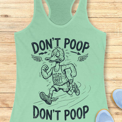 Mint green tank top with a graphic of a duck running and text 'Don't Poop' on a wooden surface.