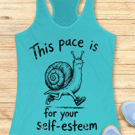 blue tank top with a runner snail and text - this pace is for your self esteem. on a wooden background
