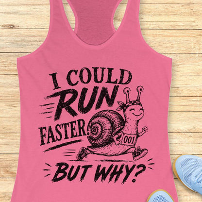 pink tank top with a running snail and text - I could run faster. but why?  on a wooden background