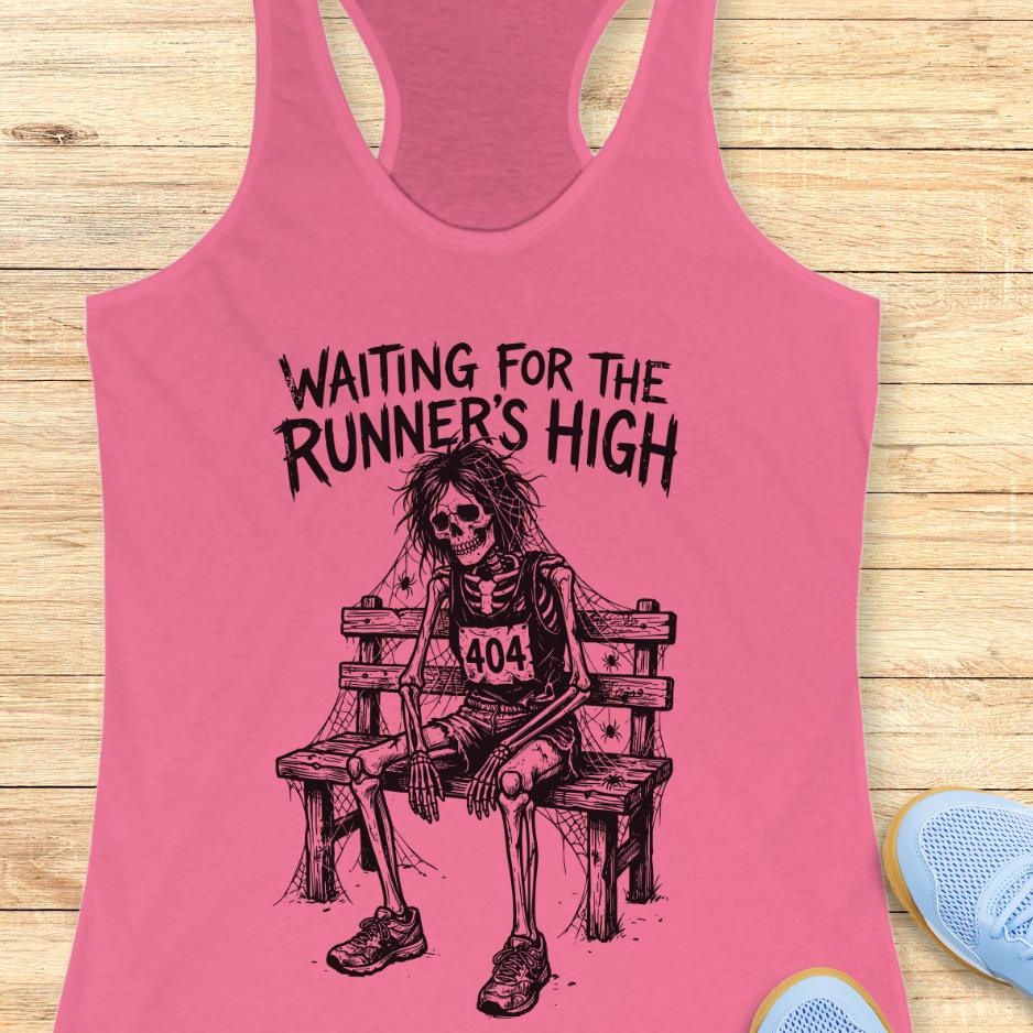 pink tank top with an image of a skeleton sitting on a bench, with a runner bib with the number 404, and text - waiting for the runner's high, on wooden background