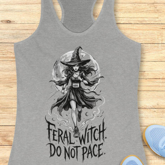 grey tank top with an image of a running witch and the text - feral witch. Do not pace. on a wooden background