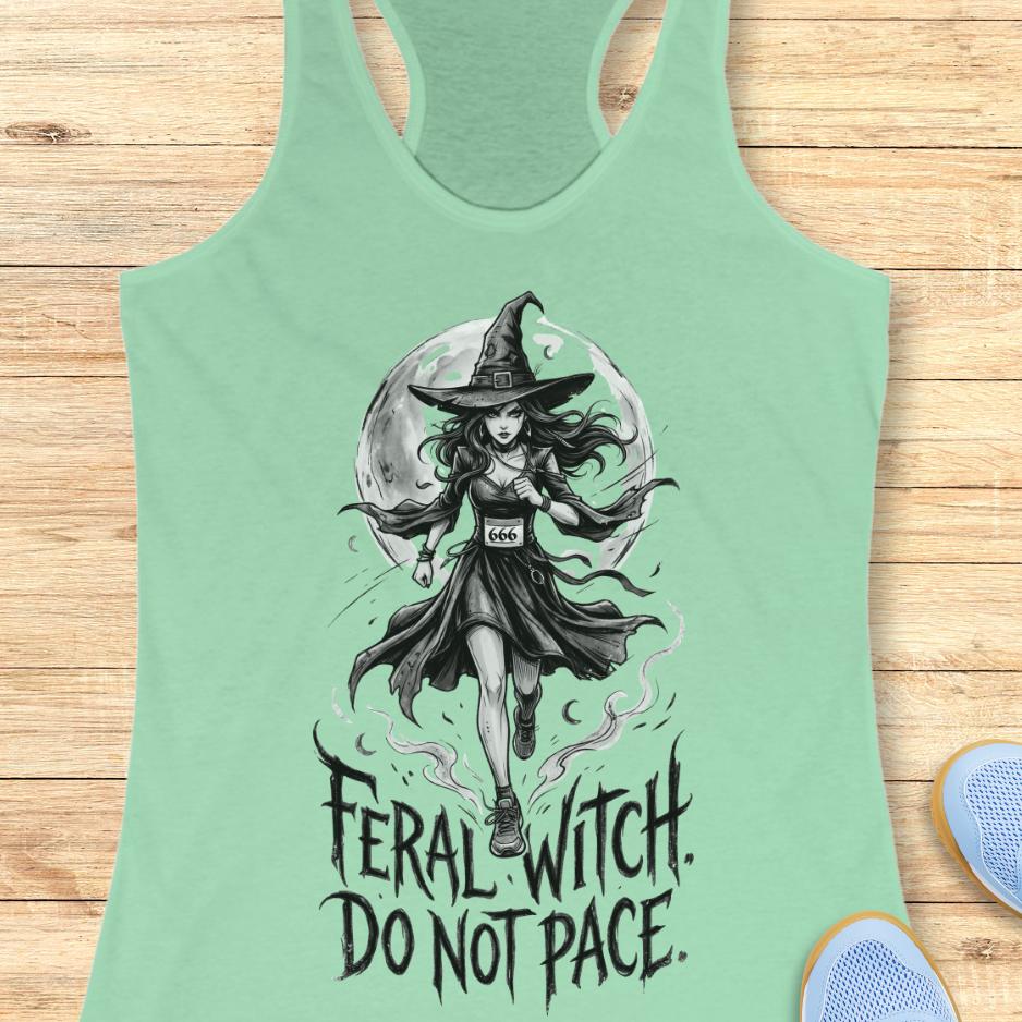 mint tank top with an image of a witch and the text - feral witch. Do not pace. on a wooden background