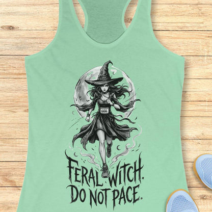 mint tank top with an image of a witch and the text - feral witch. Do not pace. on a wooden background