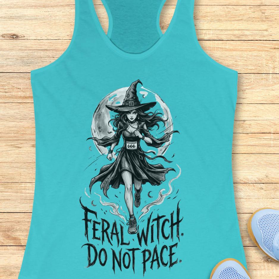 blue tank top with an image of a running witch and the text - feral witch. Do not pace. on a wooden background