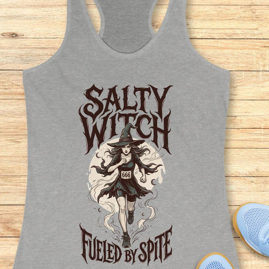 grey tank top with an image of a running witch and the text - salty witch. Fueled by spite. on a wooden background