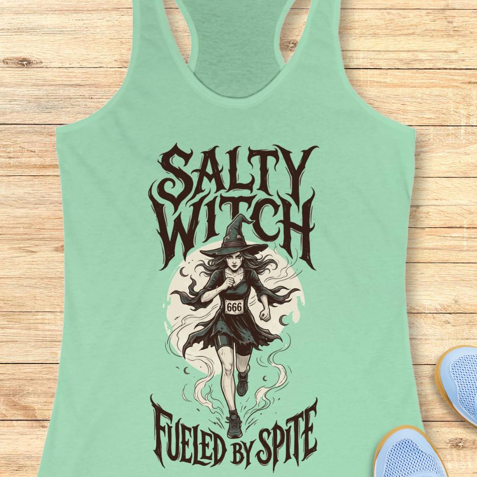 mint tank top with an image of a running witch and the text - salty witch. Fueled by spite. on a wooden background