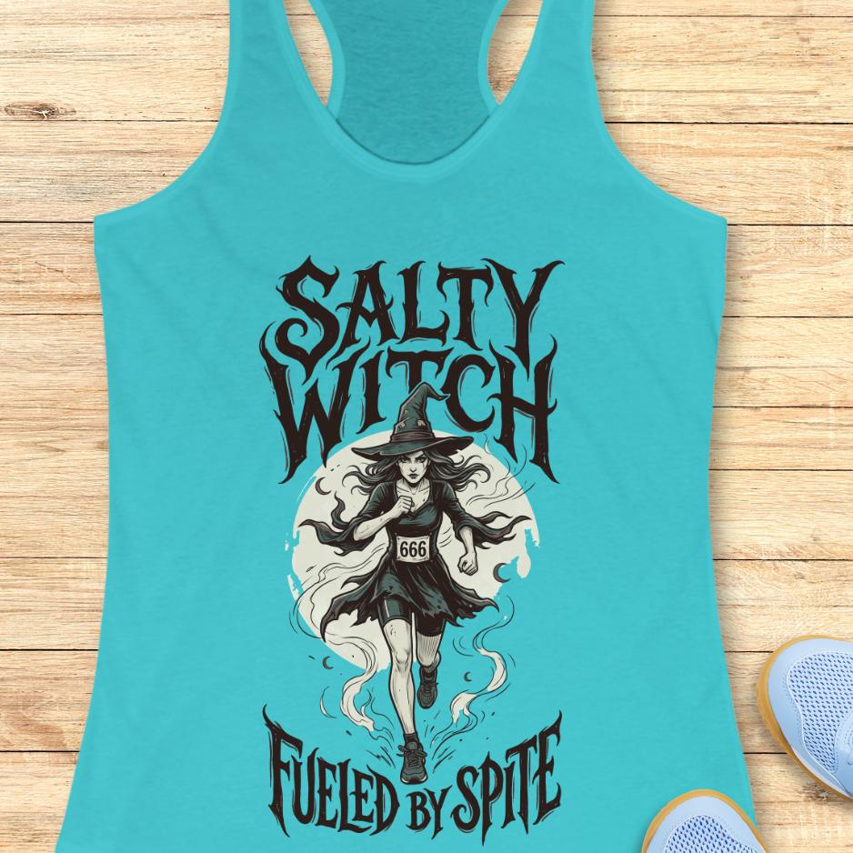 blue tank top with an image of a running witch and the text - salty witch. Fueled by spite. on a wooden background