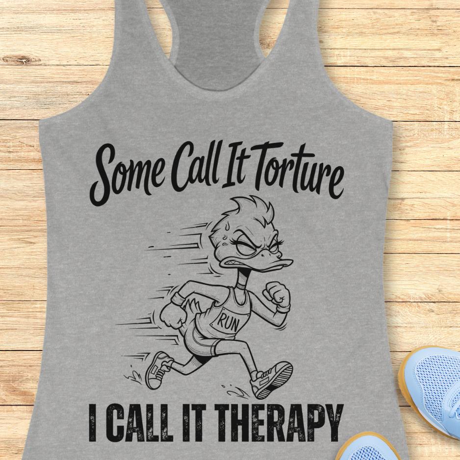 grey tank top with cartoon character and text - some call it torture. I call it therapy.  on a wooden surface