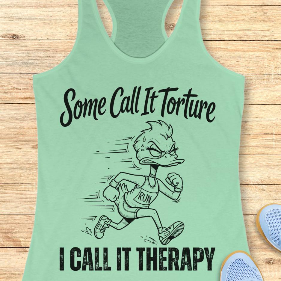 mint tank top with cartoon character and text - some call it torture. I call it therapy.  on a wooden surface