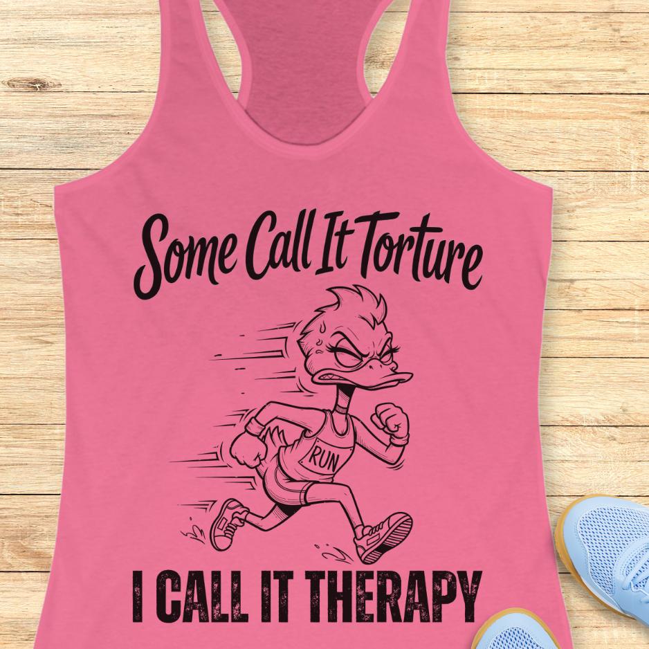 pink tank top with cartoon character and text - some call it torture. I call it therapy.  on a wooden surface