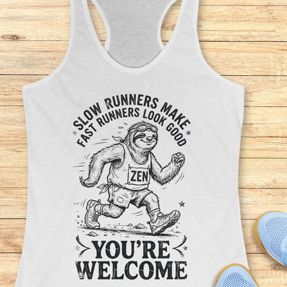 white tank top with an image of a sloth runner and the text - slow runners make fast runners look good. you're welcome. on a wooden background