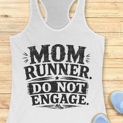 white tank top with the text - mom runner. do not engage. on a wooden background