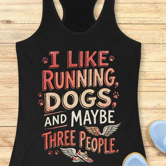 Black tank top with colorful text I like running, dogs, and maybe three people. on a wooden surface 