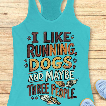 Turquoise tank top with text 'I like running, dogs, and maybe three people' on a wooden surface.