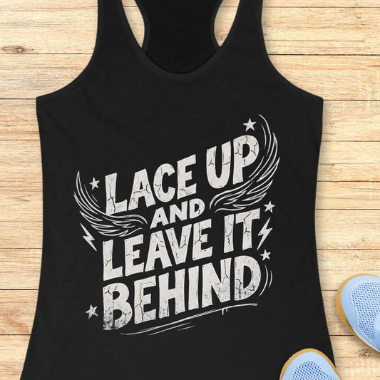 Black tank top with 'Lace Up and Leave It Behind' text on a wooden surface
