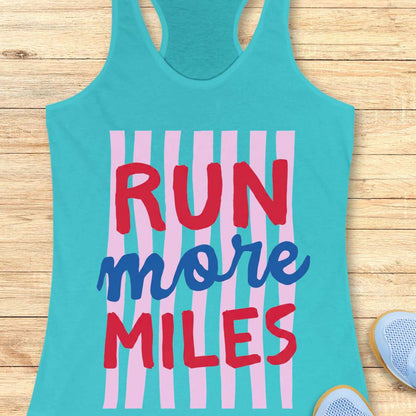 Turquoise tank top with 'RUN more MILES' text on a wooden surface