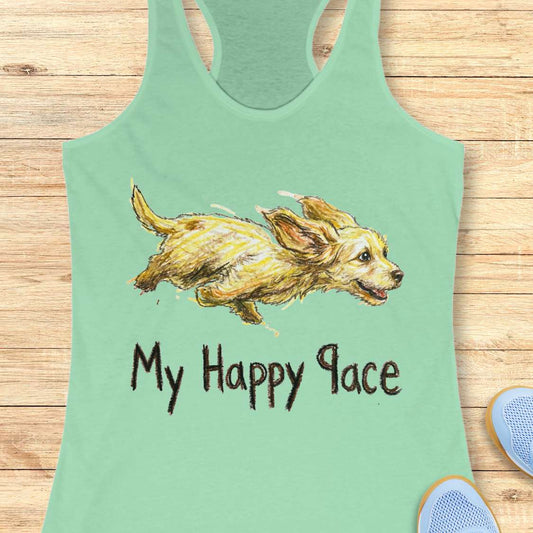 Mint green tank top with a dog illustration and 'My Happy Place' text on a wooden surface.