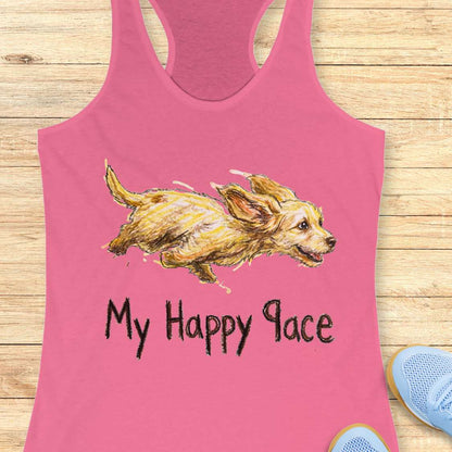 Pink tank top with a dog illustration and 'My Happy Place' text on a wooden surface.