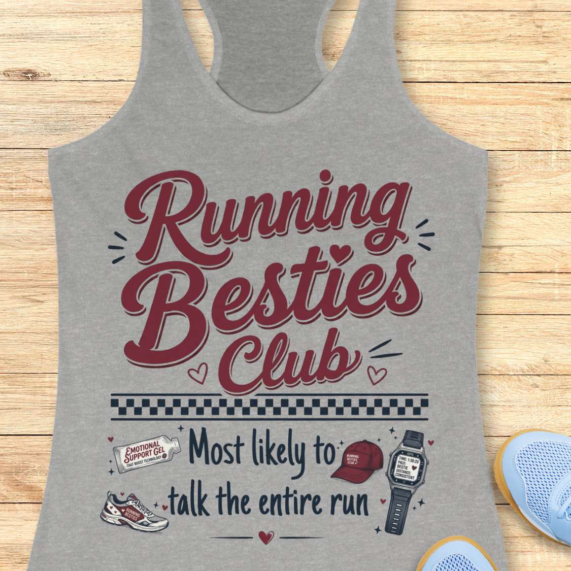 Gray tank top with 'Running Besties Club' text and graphics on a wooden surface