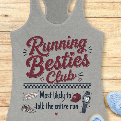 Gray tank top with 'Running Besties Club' text and graphics on a wooden surface