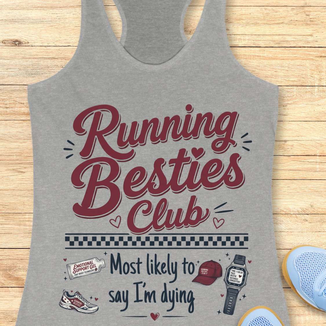 Gray tank top with 'Running Besties Club' text and graphics on a wooden surface