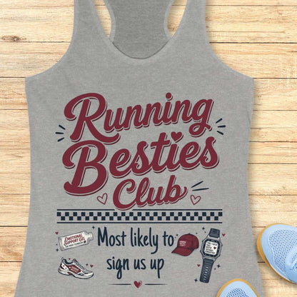 Gray tank top with 'Running Besties Club' text and graphics on a wooden surface