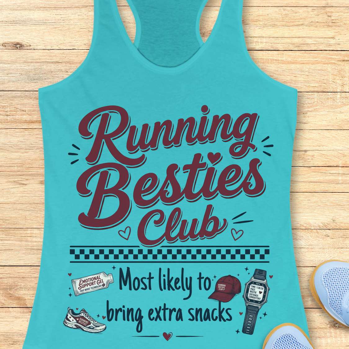 Turquoise tank top with 'Running Besties Club' text and graphics on a wooden surface