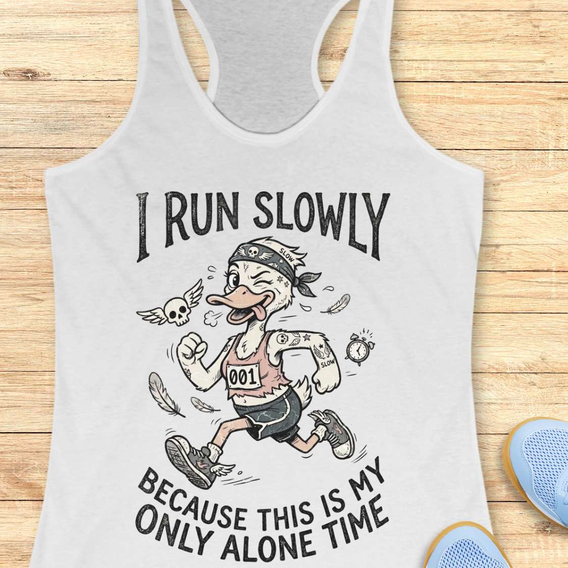 white tank top with cartoon character and text- I run slowly, because this is my only alone time,on a wooden surface
