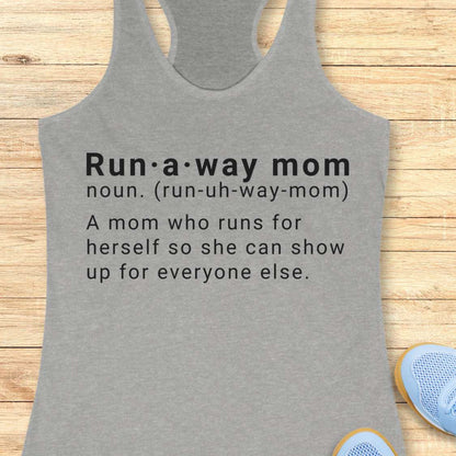 Gray tank top with dictionary definition of run a way mom text on a wooden surface