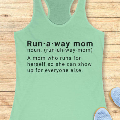 Green tank top with dictionary definition of run a way mom text on a wooden surface