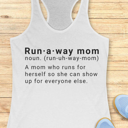 white tank top with dictionary definition of run a way mom text on a wooden surface