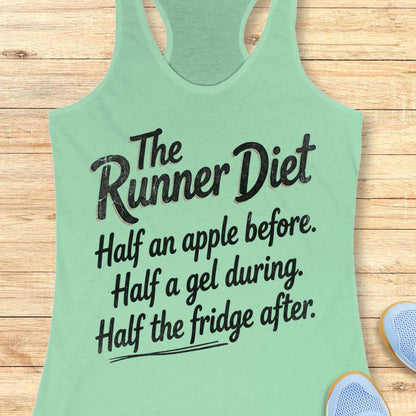 Light green tank top with 'The Runner Diet' text on a wooden surface