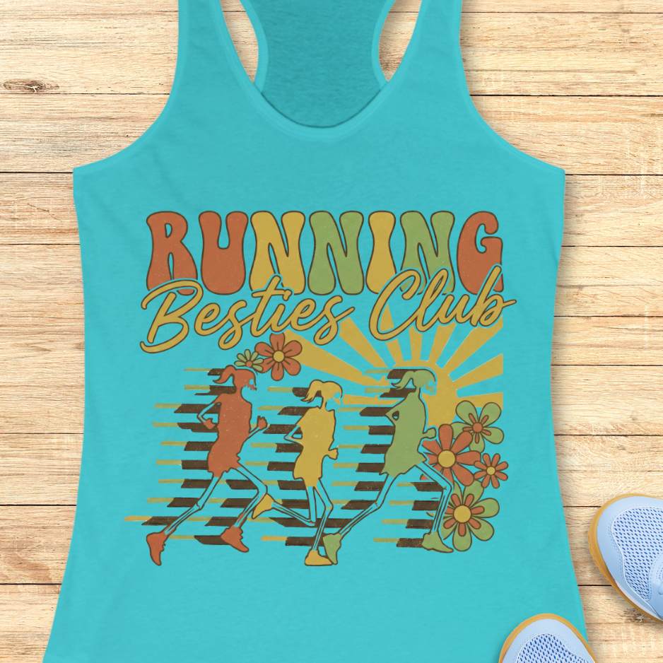Turquoise tank top with 'Running Besties Club' design on a wooden surface