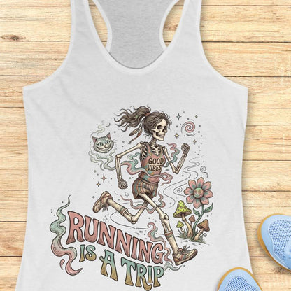 white tank top with skeleton design and 'Running is a Trip' text on a wooden surface.