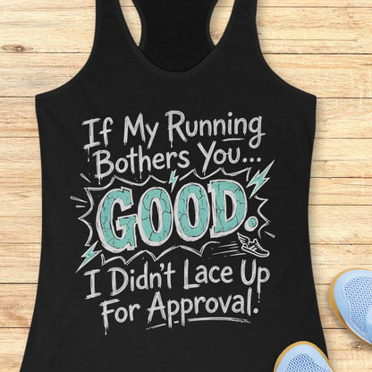 Black tank top with humorous text If my running bothers you...good. I didn't lace up for approval.  on a wooden surface