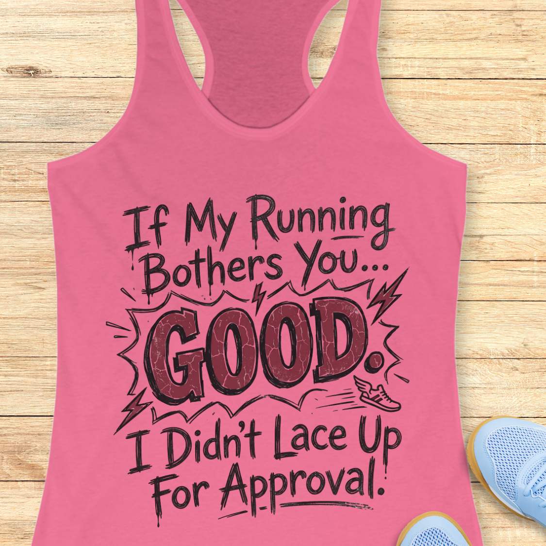 Pink tank top with humorous text If my running bothers you...good. I didn't lace up for approval.  on a wooden surface