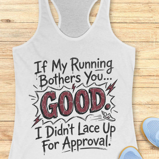 white tank top with humorous text If my running bothers you...good. I didn't lace up for approval. on a wooden surface