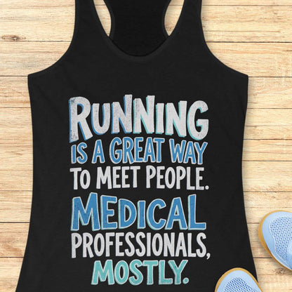 Black tank top with humorous text on a wooden surface