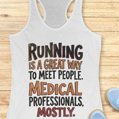 white tank top with humorous text on a wooden surface