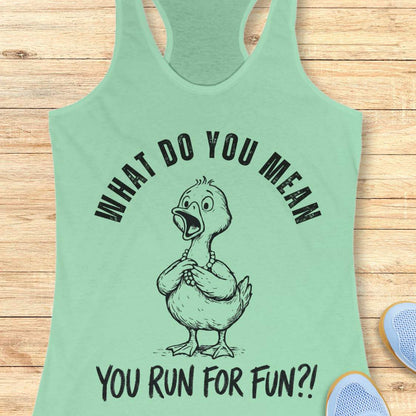Mint green tank top with a graphic of a duck and text what do you mean you run for fun, on a wooden surface