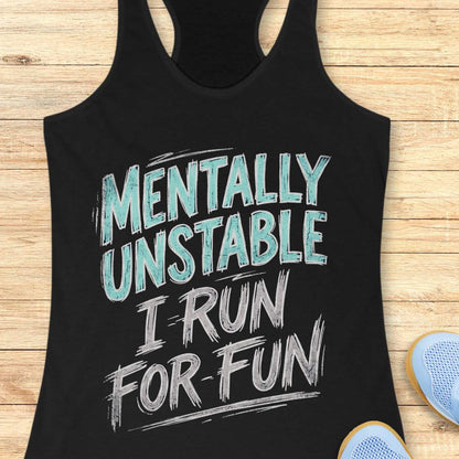 Black tank top with funny text - mentally unstable, I run for fun, on a wooden surface
