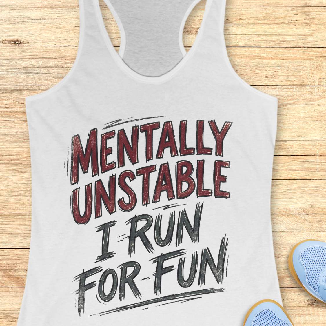 white tank top with 'Mentally Unstable I Run For Fun' text on a wooden surface.