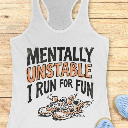 white tank top with 'Mentally Unstable I Run For Fun' text and shoe graphic on a wooden surface.