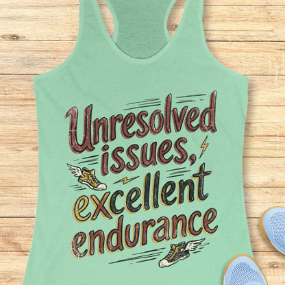 Mint green tank top with text 'Unresolved issues, excellent endurance' on a wooden surface.