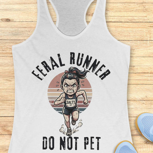 white tank top with 'Feral Runner Do Not Pet' graphic on a wooden surface